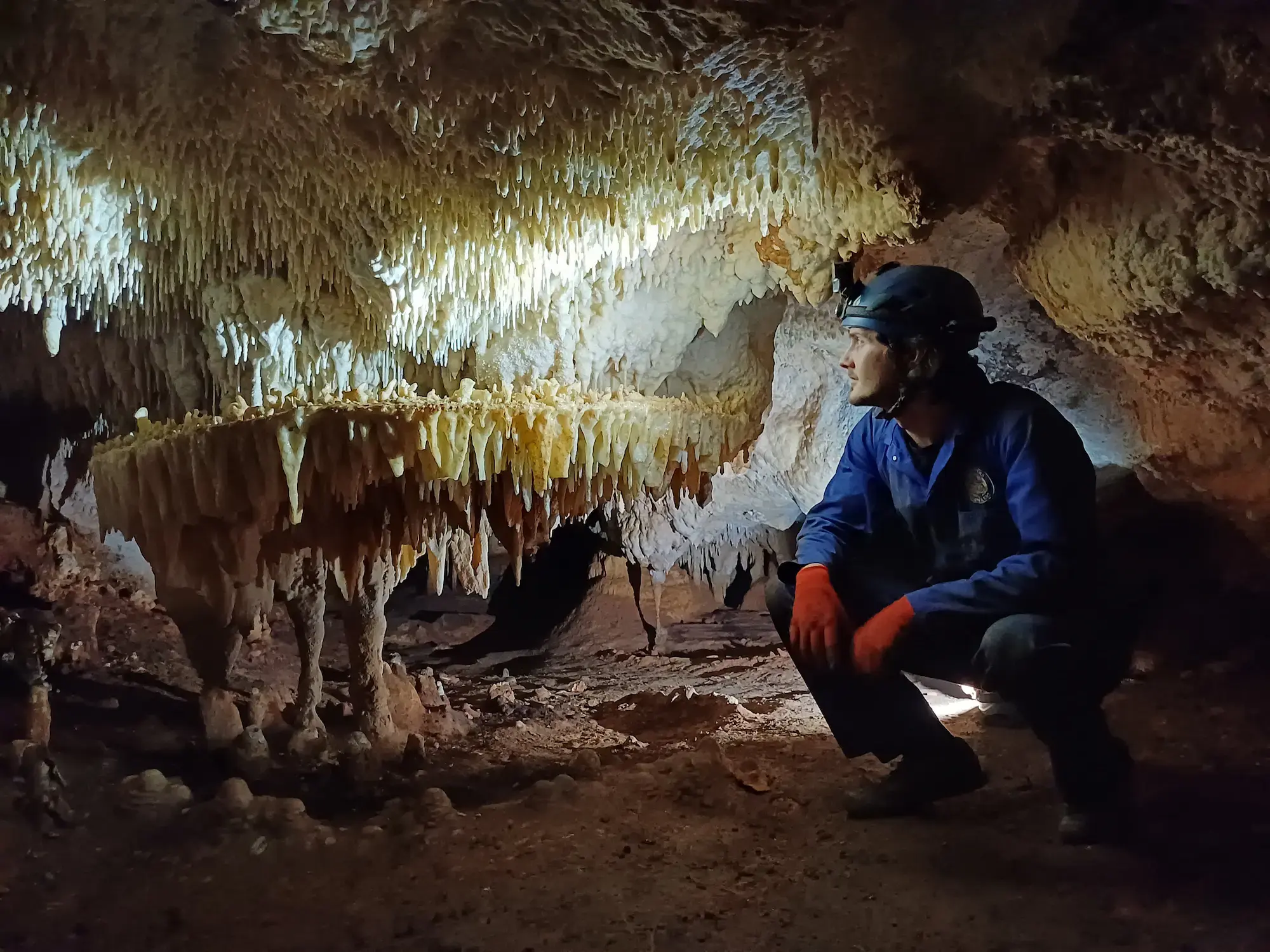 Josh Youldon observing cave formations